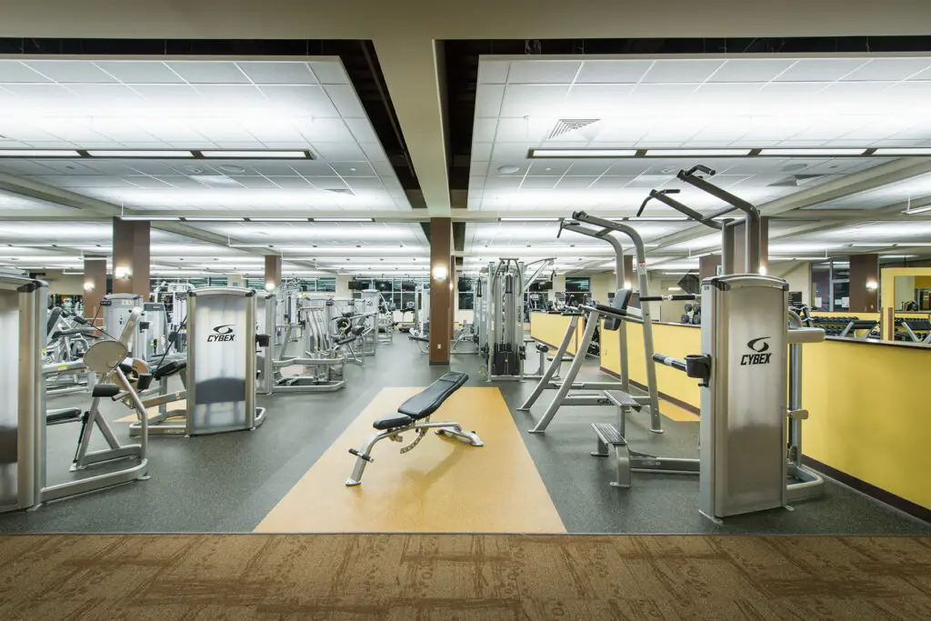 Post renovation and construction of the Half Acre Recreation and Wellness Center in Laramie, Wyoming completed by Groathouse Construction featuring the gym
