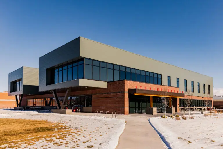 Post construction of the NWC Student Center exterior in Powell, Wyoming completed by Groathouse Construction from the front sidewalk entrance