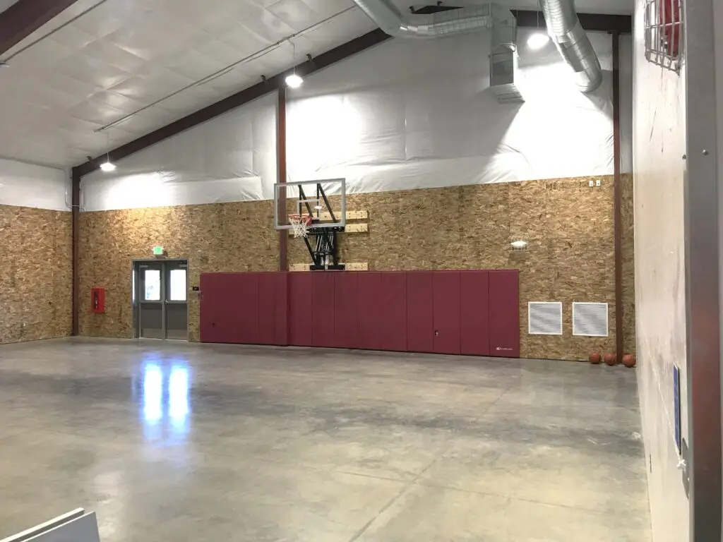 Post construction of the Meeteetse Community Center basketball court completed by Groathouse Construction in Meeteetse, WY