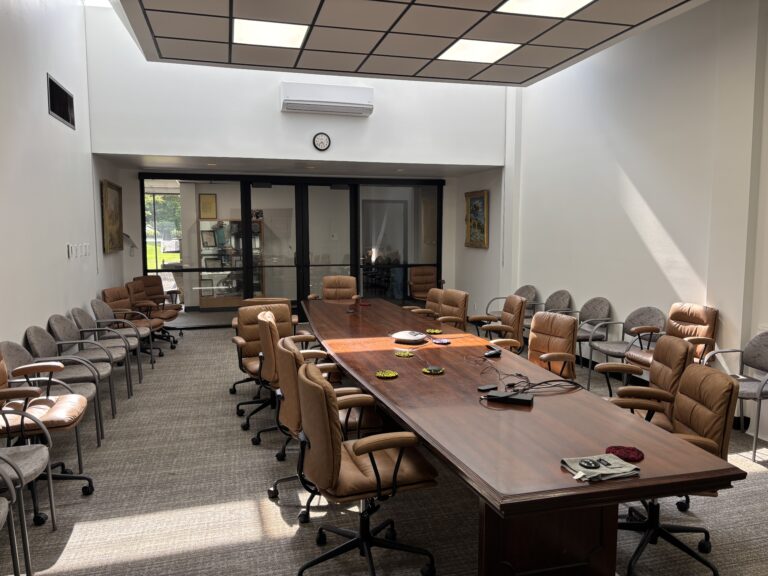 Post renovation of the conference room of the GSA Forest Service in Cody, Wyoming completed by Groathouse Construction .